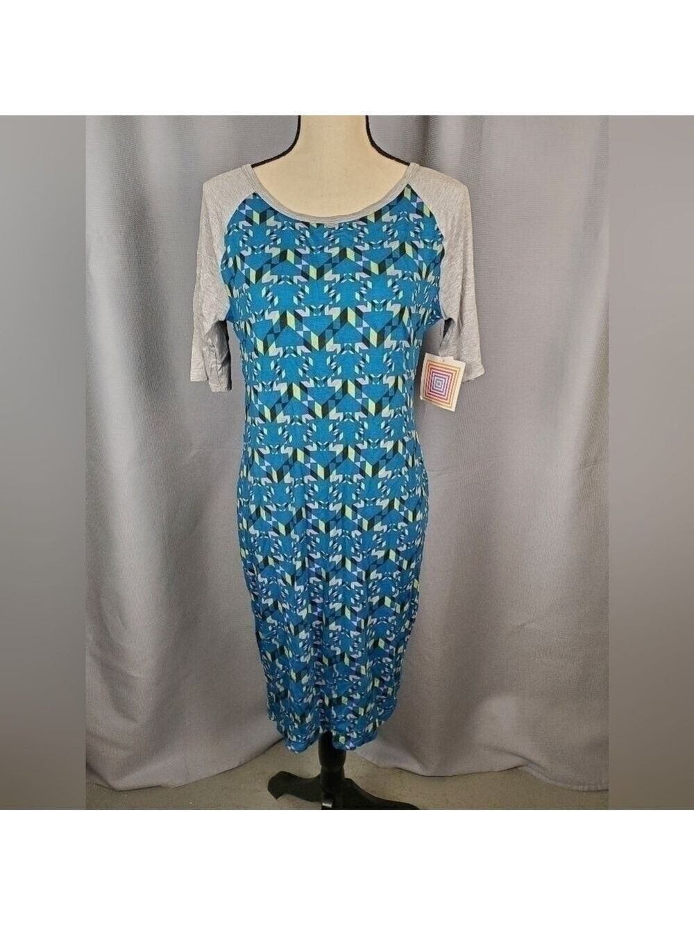 NWT Lularoe Julia, blue w/multicolored geometric pattern/gray sleeves, size M